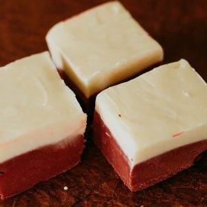 three red velvet fudge squares